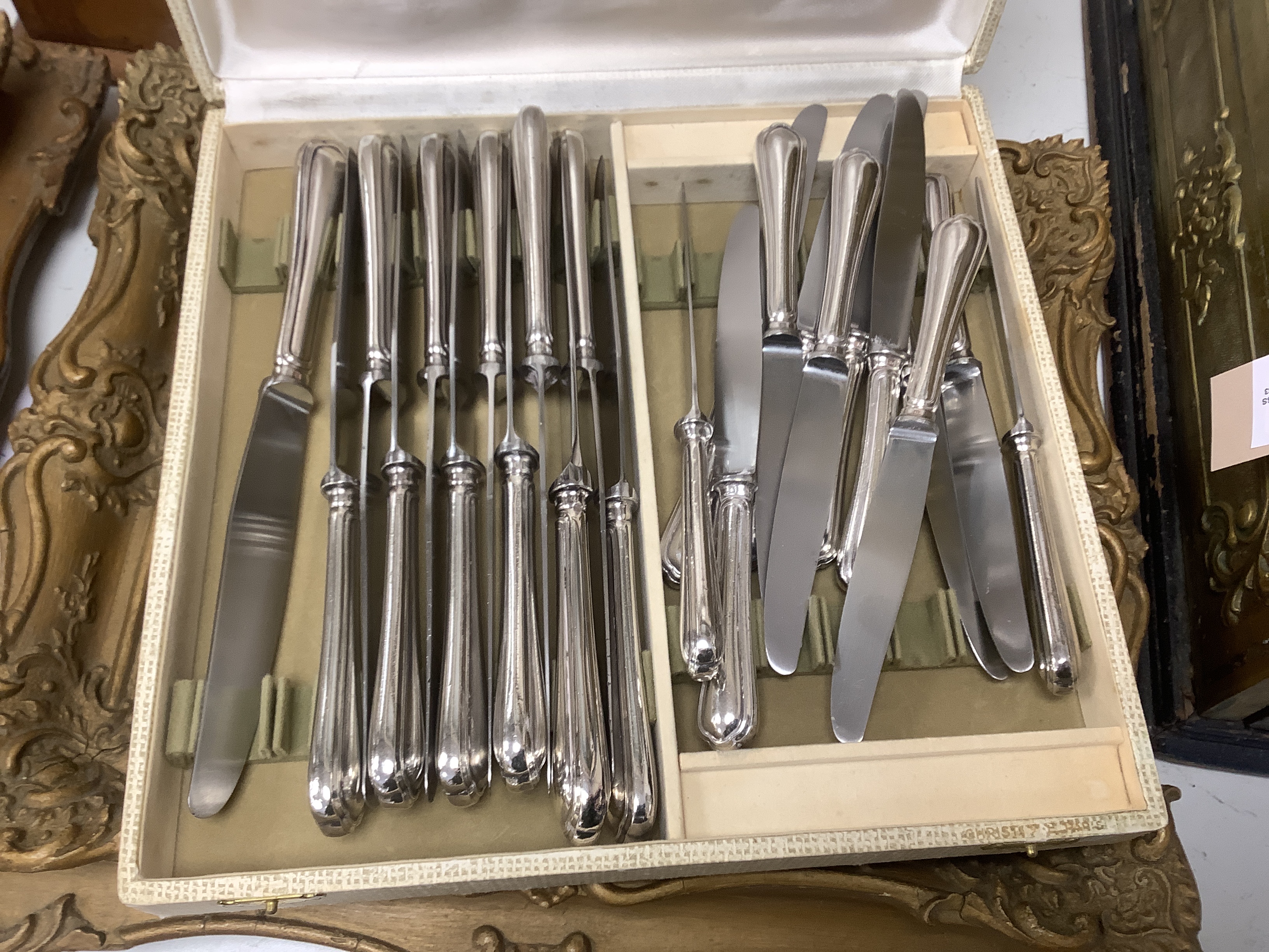 A pair of WMF coasters and two Christofle canteens of cutlery etc